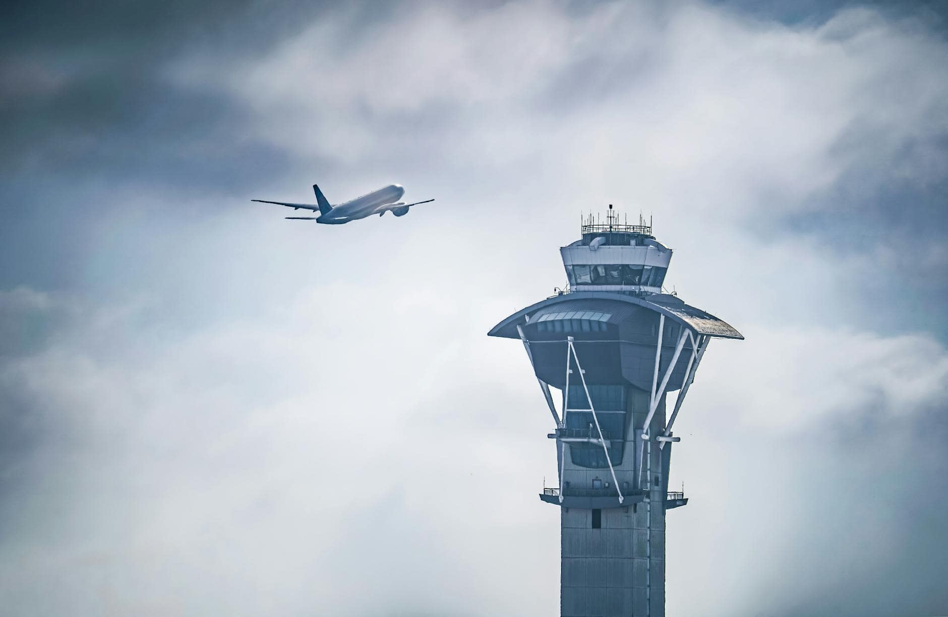 airplane taking off near lax control tower .NOTAMs in crisis response – early aviation signal during global emergencies.